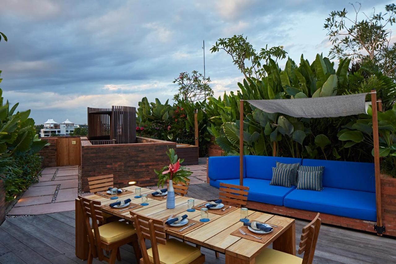 Potato Head Suites & Studios Seminyak Kültér fotó The rooftop bar at the hotel