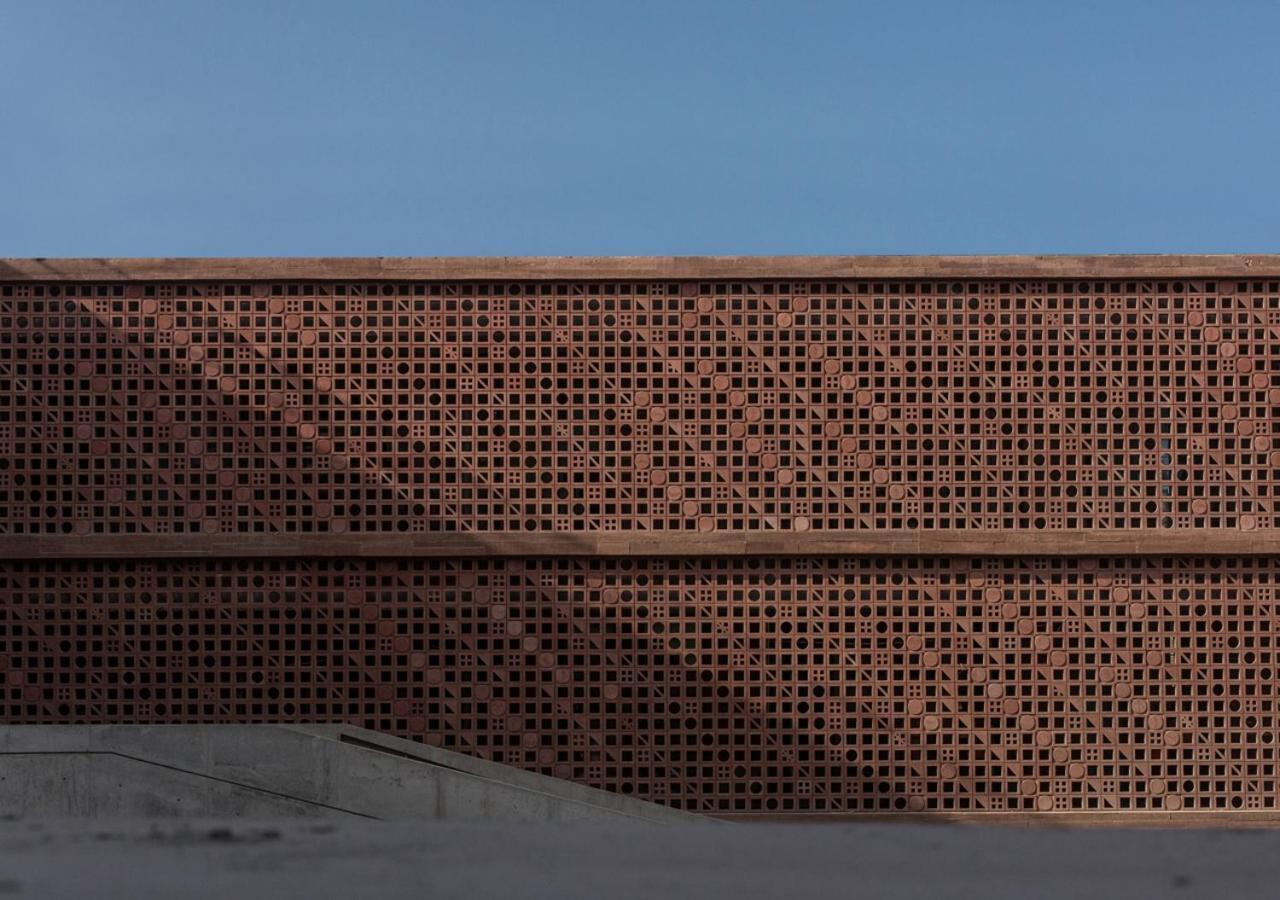 Potato Head Suites & Studios Seminyak Kültér fotó The perforated brick facade